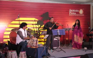 Ambika Jois, a versatile singer performing at the event along with her father Chandru Jois also known as Violin Chandru