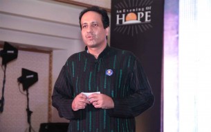 Mr Dinesh Malkani, President of Cisco India, gives the welcome note for the evening