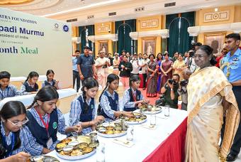 Children relishing meals. Smiles of pride and joy all around.