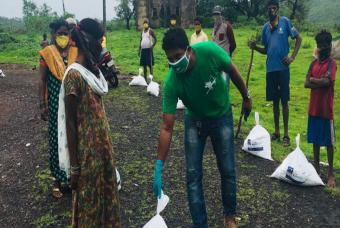 Grocery kit being handed out in an organized manner