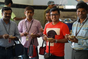 Techies at Global Village Tech Park tasting Akshaya Patra food