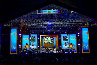 The stage comes alive as the Maestro begins to orchestrate the music.