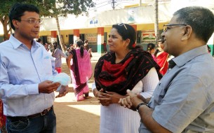 Mr Bansal interacting with members of Team Akshaya Patra to understand the workings of the organisation